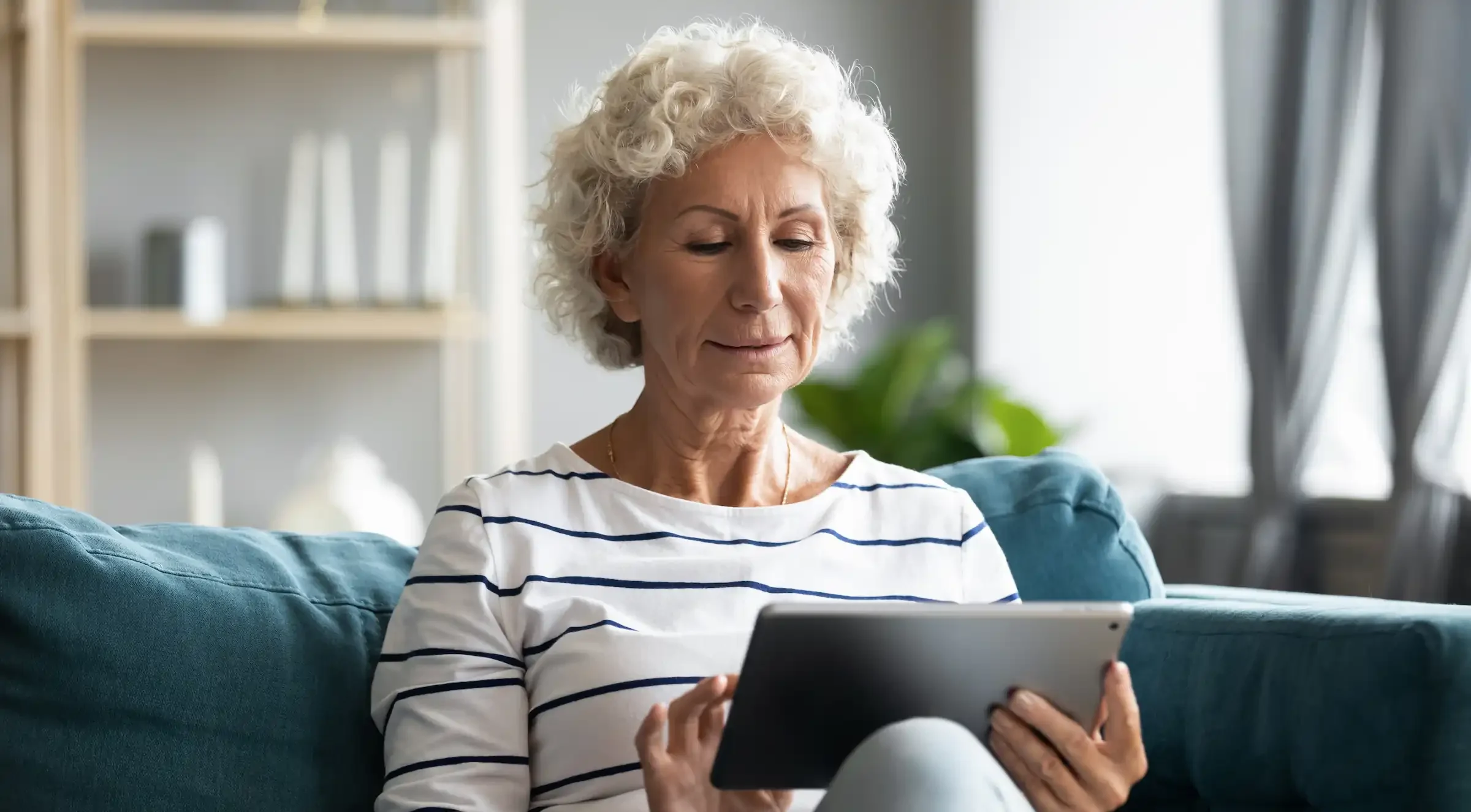 Senior woman using tablet