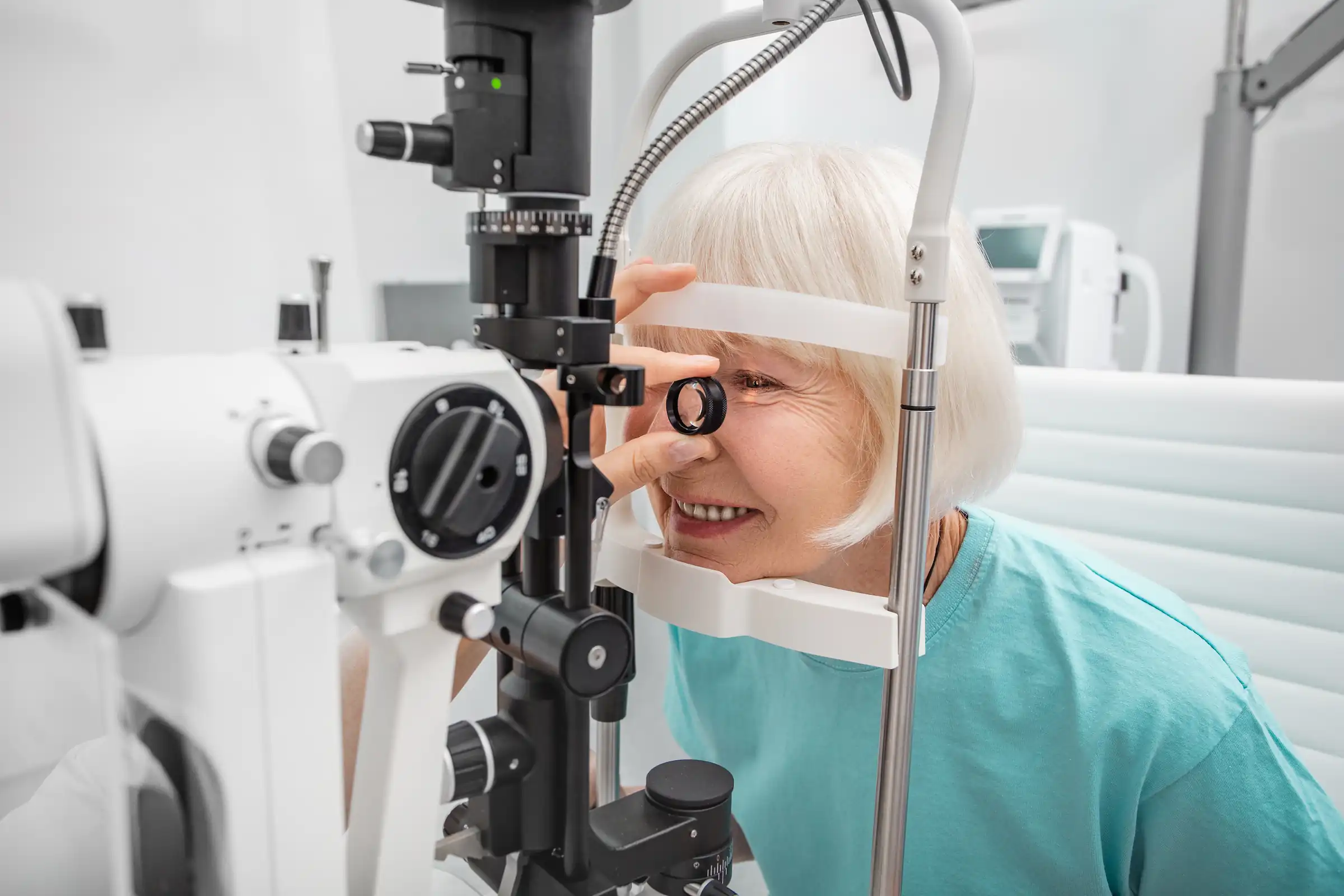 Senior woman having retina exam